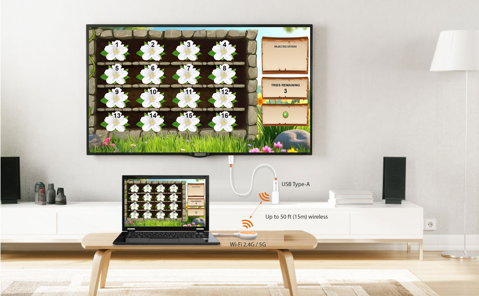 Laptop wirelessly casting to a wall-mounted TV via j5create ScreenCast — 50 ft range, Wi-Fi 2.4G/5G